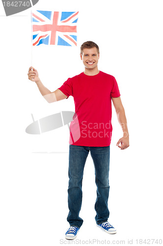 Image of Causal guy waving United Kingdom flag
