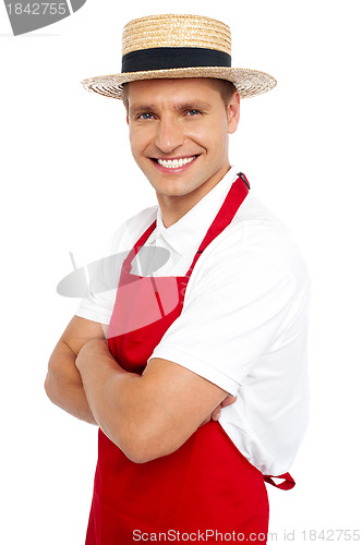 Image of Relaxed portrait of smiling handsome chef