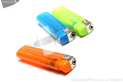 Image of three colorful lighters