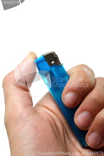 Image of blue lighter in human hand