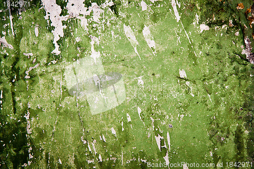 Image of stained green in a spray wall