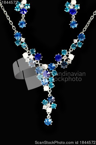 Image of necklace with pendants and earrings