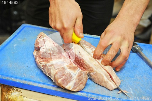 Image of cutting meat