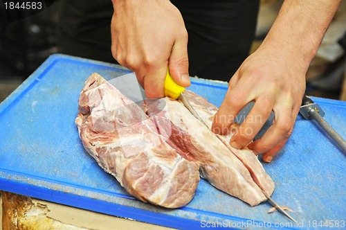Image of cutting meat