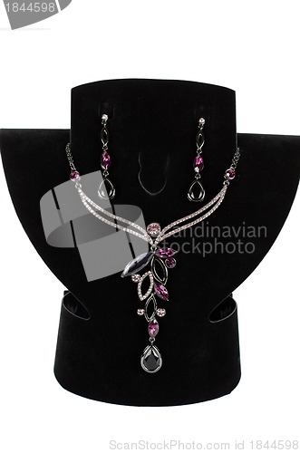 Image of necklace with pendants and earrings