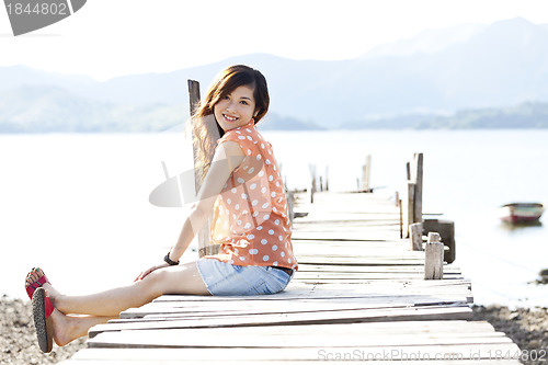 Image of Asian woman with happy face