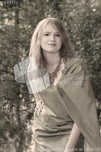 Image of Beautiful woman in green