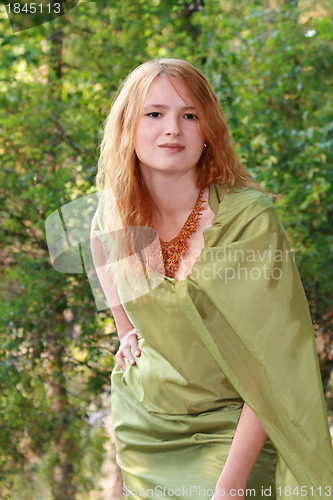 Image of Beautiful woman in green