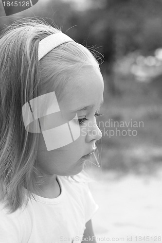 Image of Little thoughtful girl
