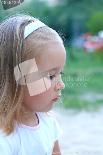Image of Little thoughtful girl