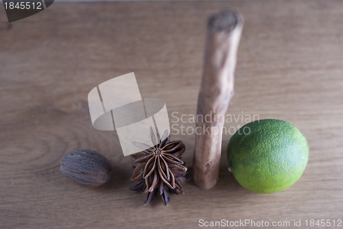 Image of Lime, cinnamon,star anise, and nutmeg
