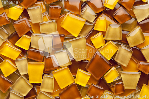 Image of amber glass mosaic tiles