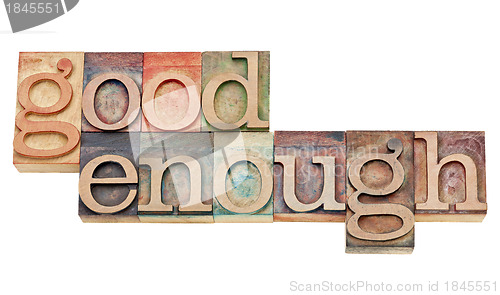 Image of good enough phrase in wood type