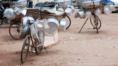 Image of Pots and pans on bicycles