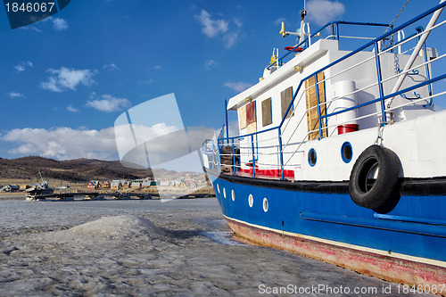 Image of boat in frozen baikal