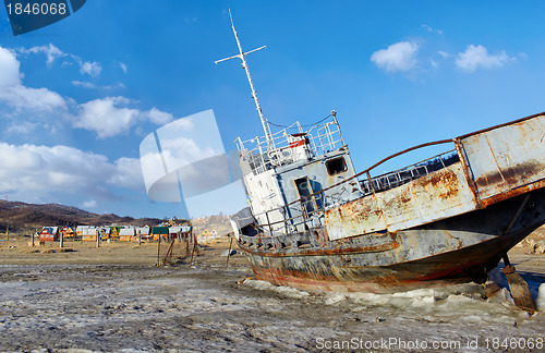 Image of boat in frozen baikal