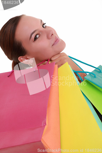 Image of Young beautiful woman with shopping bags