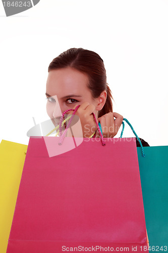 Image of Young beautiful woman with shopping bags