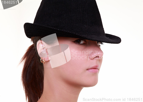 Image of Serious young woman with hat