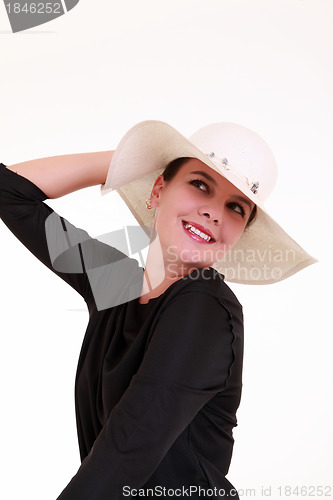 Image of Young woman with white summer hat