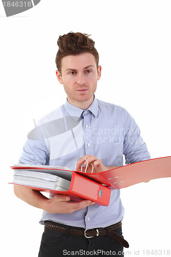 Image of Young man holding folders