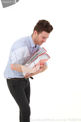 Image of Young man smiling with folders
