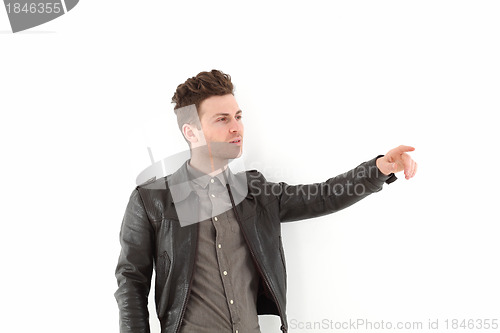 Image of Young adult man posing with leather jacket