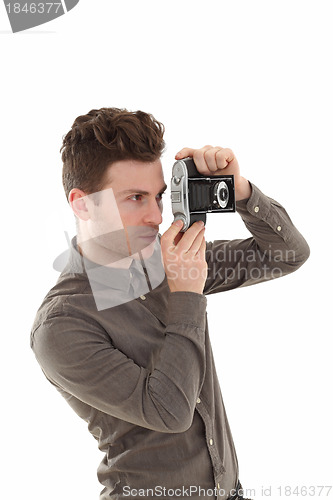 Image of Young adult male with olf film camera