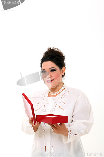 Image of Elegant plus size woman with a box