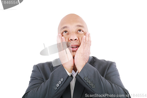 Image of Shocked businessman isolated on a white background. 