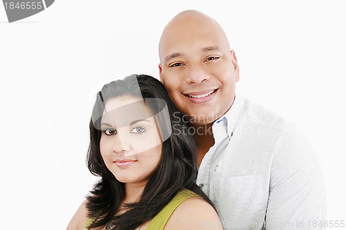 Image of Closeup portrait of a sweet happy young couple smiling together.