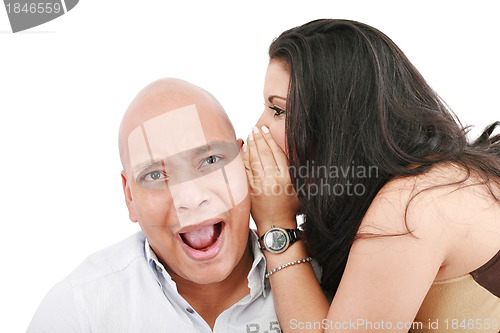 Image of Closeup portrait of a cute young woman whispering in her husband