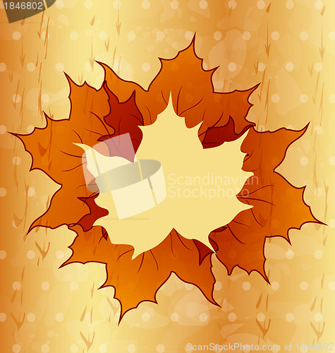 Image of Autumnal maple leaves, wooden texture