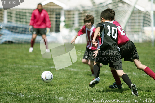 Image of Boys Playing Soccer