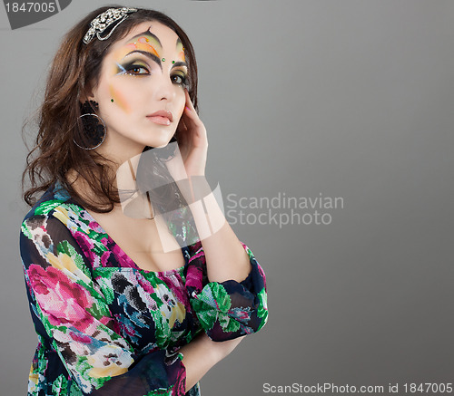 Image of Portrait of cute girl with idnian make up