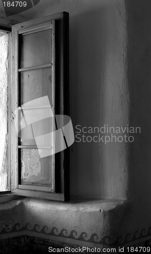 Image of Black and white image of an open window in the Mission of Santa