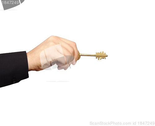 Image of Businessman's Hand Holding Key