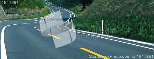 Image of Empty curved road