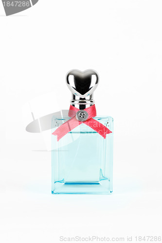 Image of women's perfume in beautiful bottle isolated