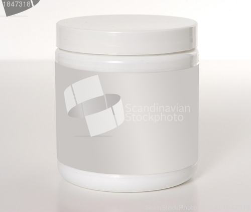 Image of close up of beauty cream container on white background