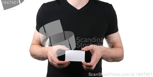 Image of man holding blank business card