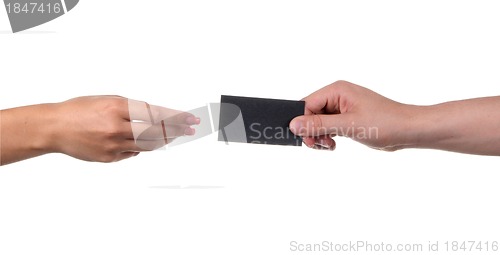 Image of Businessman's hand holding blank paper business card