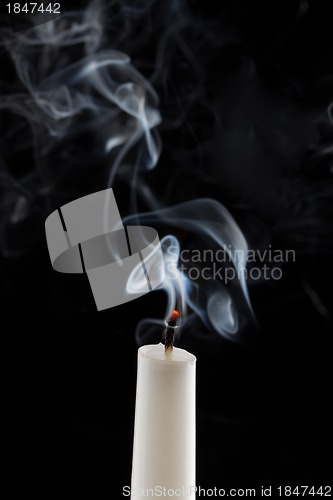 Image of Extinguished candle with smoke (Metaphor of the death)