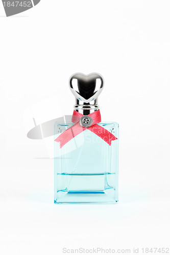 Image of women's perfume in beautiful bottle isolated