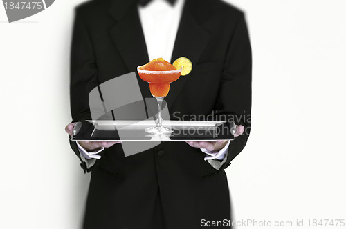 Image of Manhattan Cocktail Being Served by Waiter on Silver Tray