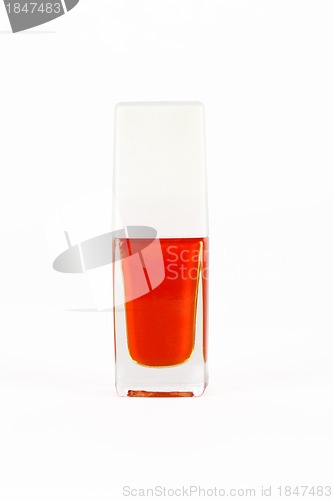 Image of red nail polish bottle on white background