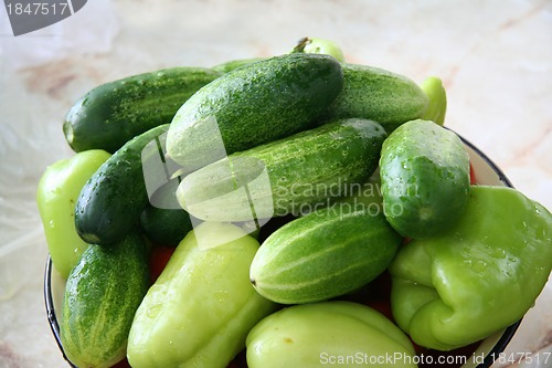 Image of Fresh salted cucumbers with green pepper