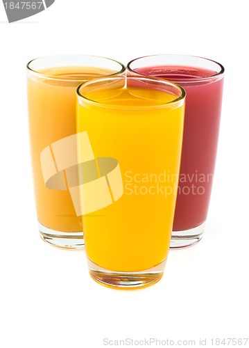 Image of Tropical juices in glasses isolated on white