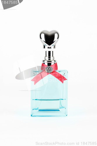 Image of women's perfume in beautiful bottle isolated