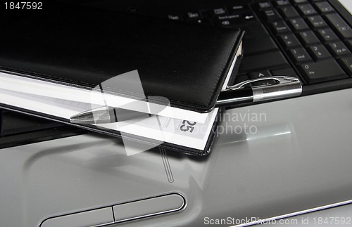 Image of laptop and Notebook